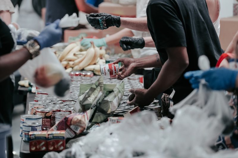 Volunteers working together at a donation drive